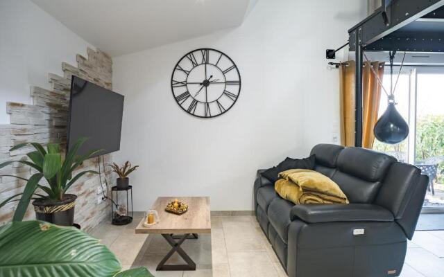 Loft avec jardin et parking privé