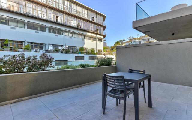 One Bedroom With Balcony and City Views