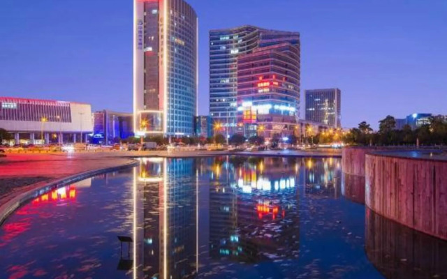 Kunming Xinshichao Hotel (Luo Tsuen Wan New Asia Sports City Branch)