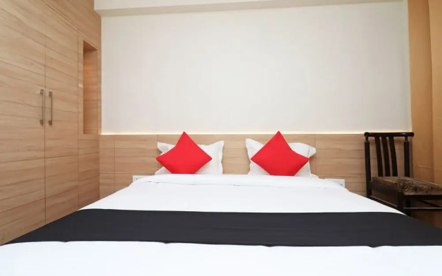 Capital O 30624 Hotel Triton