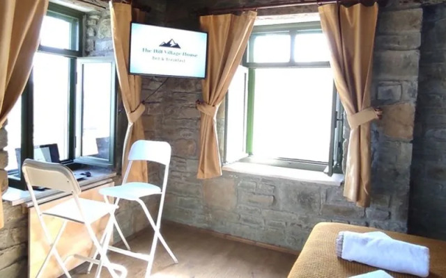 The Hill Village House
