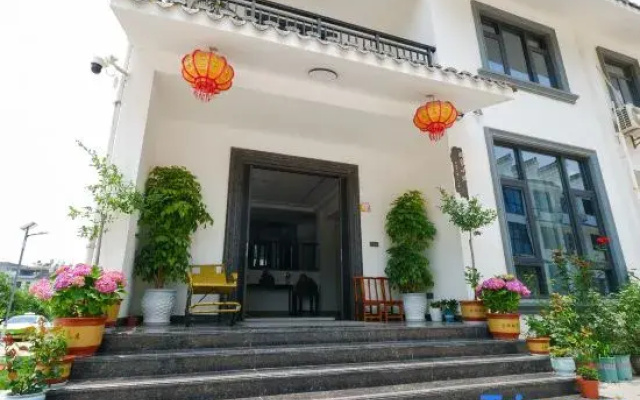 Yi Jia Xiao Zhu