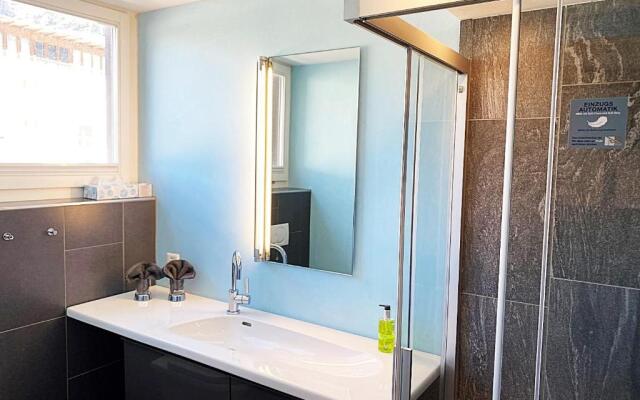 Dachwohnung im Alpenstil, 60m2 für 2P, mit Garage BM186