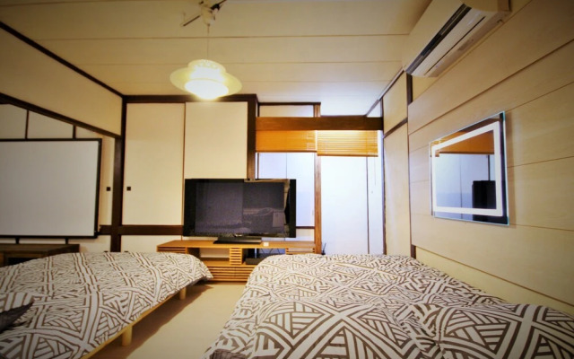 Sapporo Dome Front House