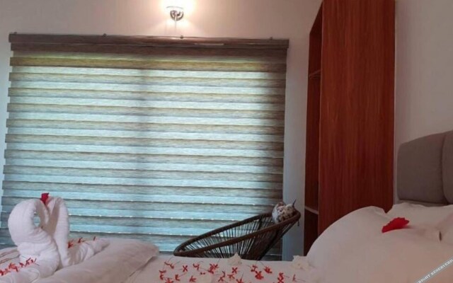 Palm Rest Hotel