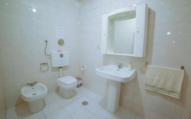 Quarto com 4 camas (Beliches+ 1 Sofá-cama)