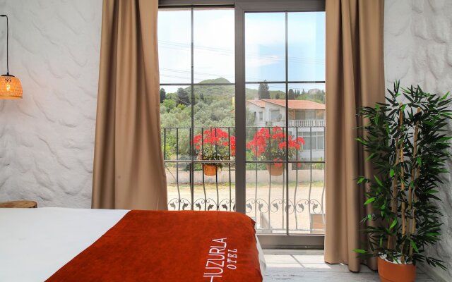 Huzurla Otel