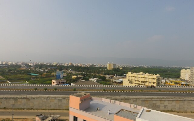 OYO 10701 Moukthi Apartment