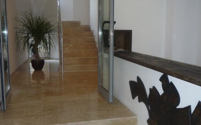 Neva Guest Rooms and Studios