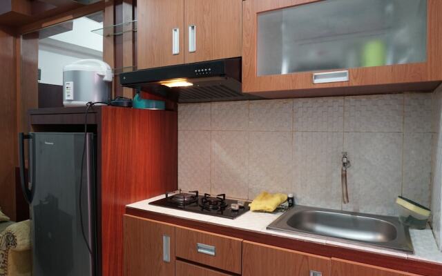 Homey and Warm 2BR Green Pramuka Apartment