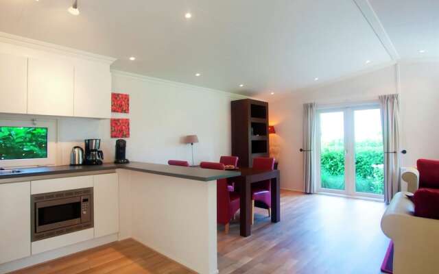 Well-kept chalet with dishwasher, close to Park De Veluwe