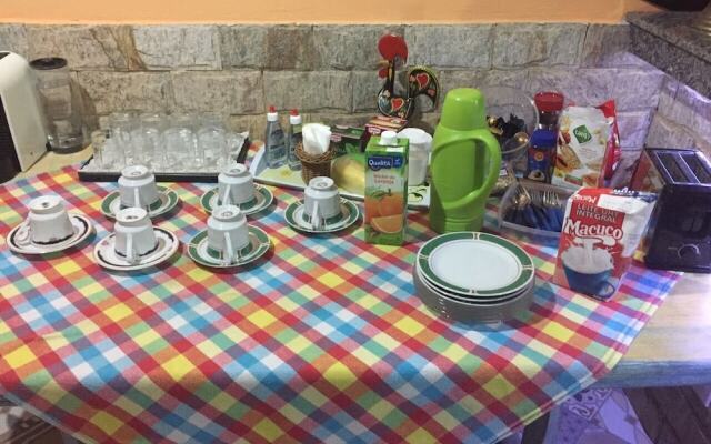 Gato de Botas Flats & Suites