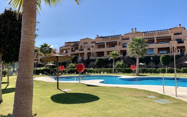 Casares Beach Golf Apartment With Private Garden and Pool Access
