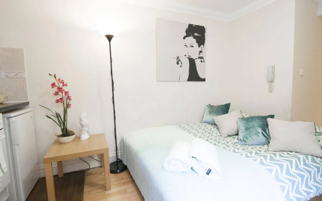 Queen's Club Apartments