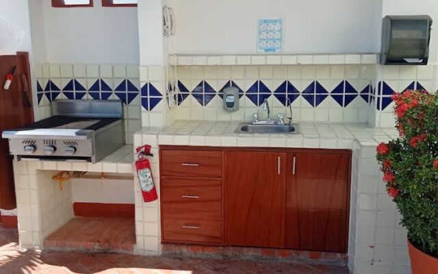 WIVC Casa de la Playa Condo - Literally on the Beach with Swimming Pool & Jacuzzi