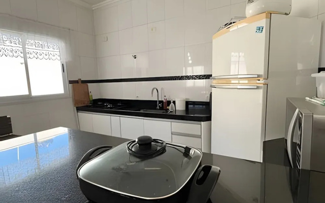 Casa com piscina em Bertioga 1