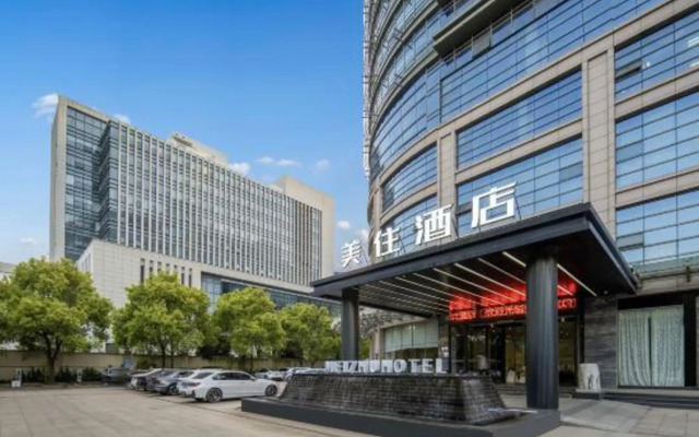 Taizhou Meizhu Hotel (Jiaojiang City Government Avenue Baolongcheng Store)