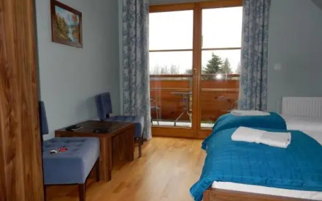 Domek za Strugiem - pokoje i apartamenty