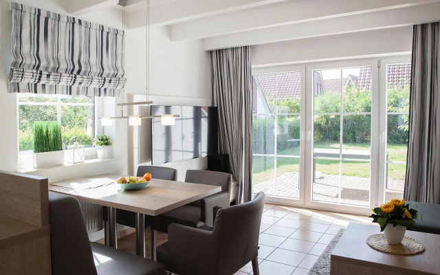 Apartment in Burhave with a shared pool