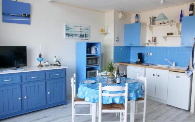 Face à la mer : appartement lumineux