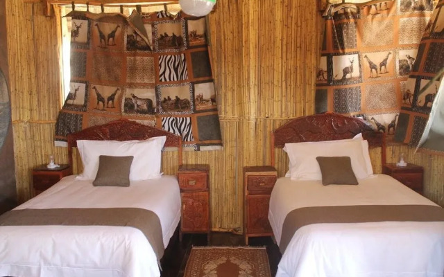 Dzibanana Lodge & Camping