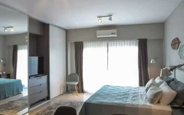 The Feather Comfortable Studio With Balcony