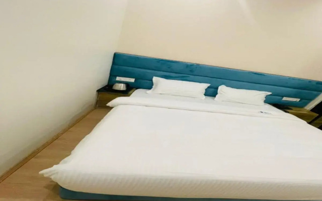 Capital O 80450 Hotel Shubham Residency