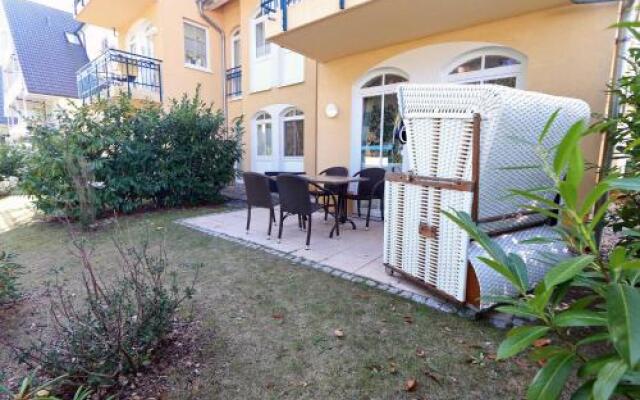 Kurparkresidenz Baabe - Ferienwohnung Meeresgarten mit Terrasse