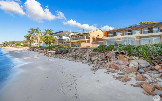 Seaside Sanctuary - Waterfront Luxury Home with Heated Pool