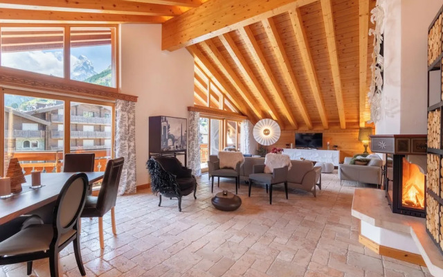 Mountain Exposure Luxury Chalets & Penthouses & Apartments