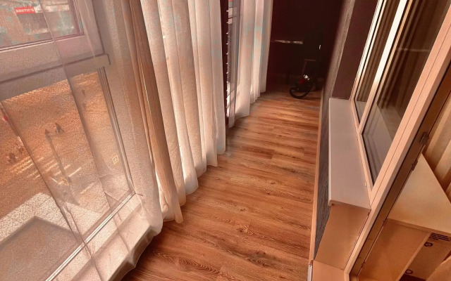 Апартаменты на проспекте Строителей 18 корпус 1