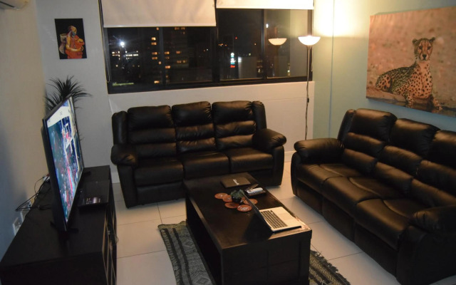 Highrise Windhoek apartment with skyline view, pool and gym