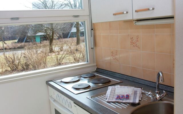 Detached holiday home, decorated with wood, on the Ostsee