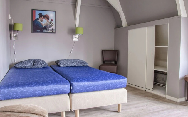 Characteristic house with a garden, surrounded by forest