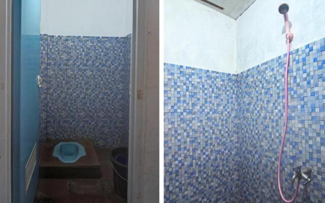 SPOT ON 91799 Sosonopan Homestay Near LANTAMAL VIII MANADO
