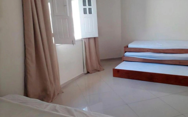 Casa Paraná com 8 quartos acomoda até 40 pessoas