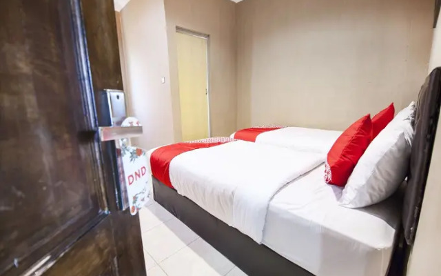 Coin Mulia Hotel By OYO Rooms