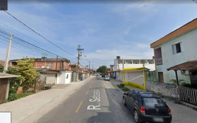 Casa de praia com piscina e churrasqueira - Indaiá Bertioga