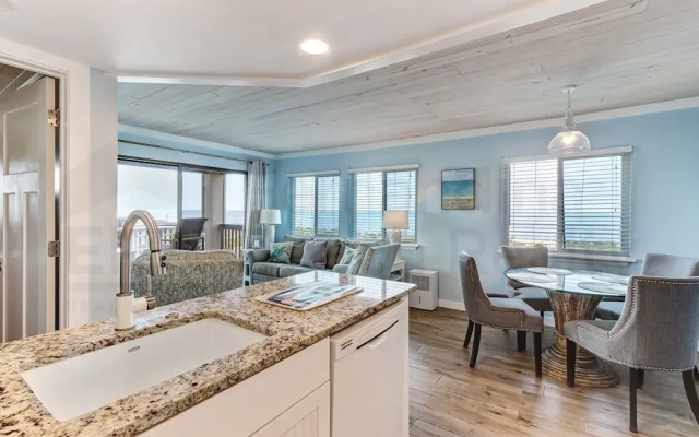 Newly Remodeled Oceanfront Condo with Salt Water Pool and Private Walkway to Beach by RedAwning