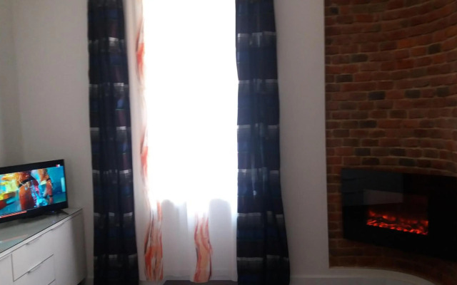 Apartment with fireplace