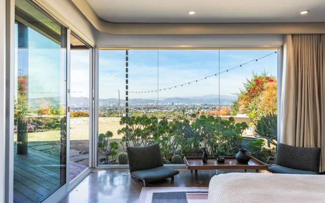 Stylish Hillside Retreat with Pool & Views