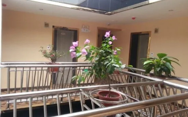 Xinmeijia Business Hotel (Huatian Town)