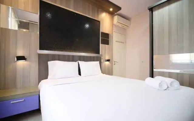 Homey and Best Location 2BR at Twin Tower Apartment By Travelio – Guest Rooms – Surabaya