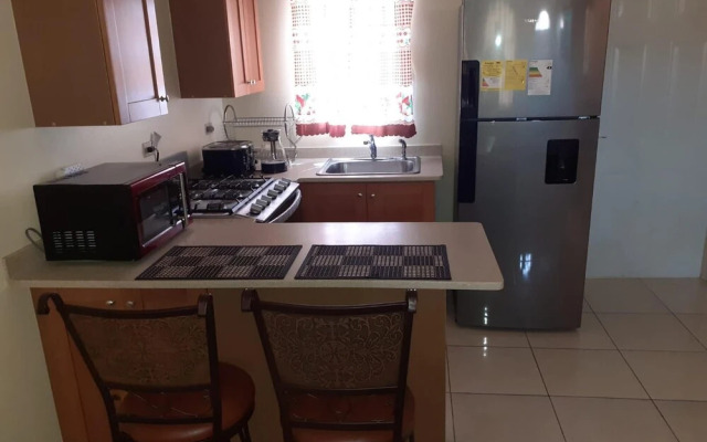 Charming 2-bed House in Portmore Gated Community
