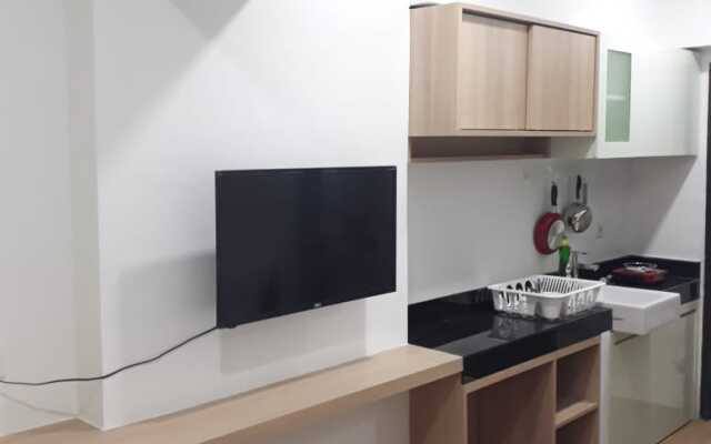 The Jarrdin Apartment by Berdikari Group