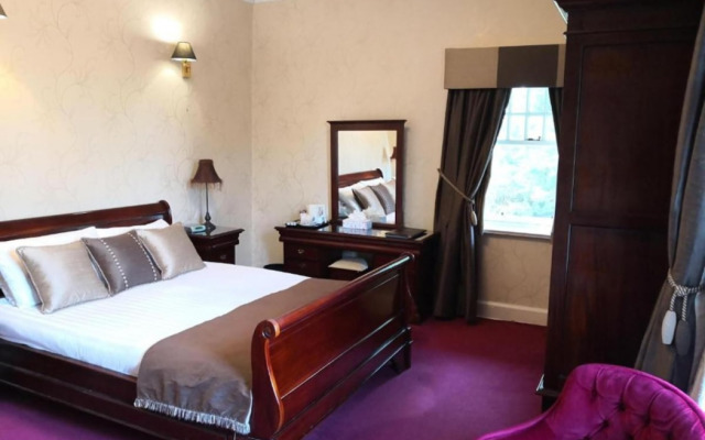 OYO Dunmar House Hotel