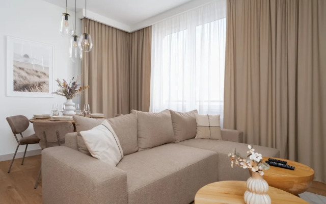 Beige Apartment Poznań by Renters