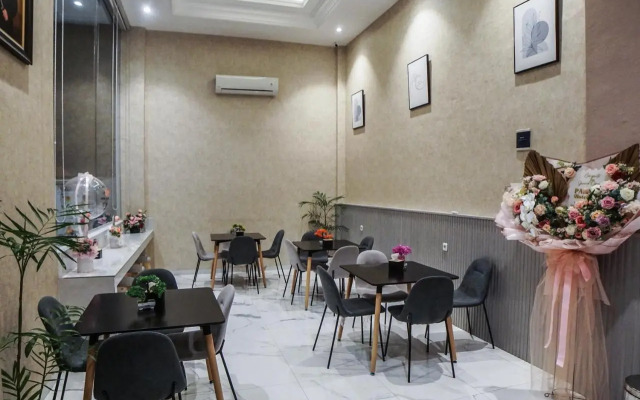 Super Oyo Capital O Papakoel Hotel & Cafe