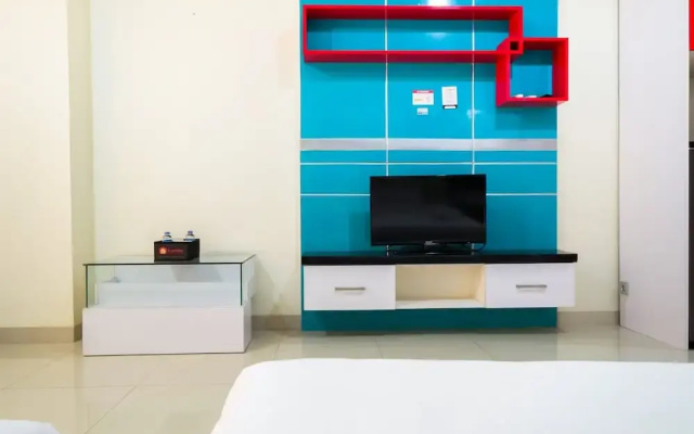 Family Studio Room at Ancol Mansion Apartment By Travelio