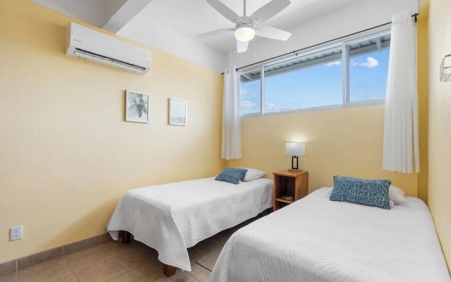 Modern Top-Floor Condo with Panoramic Views and Community Pool